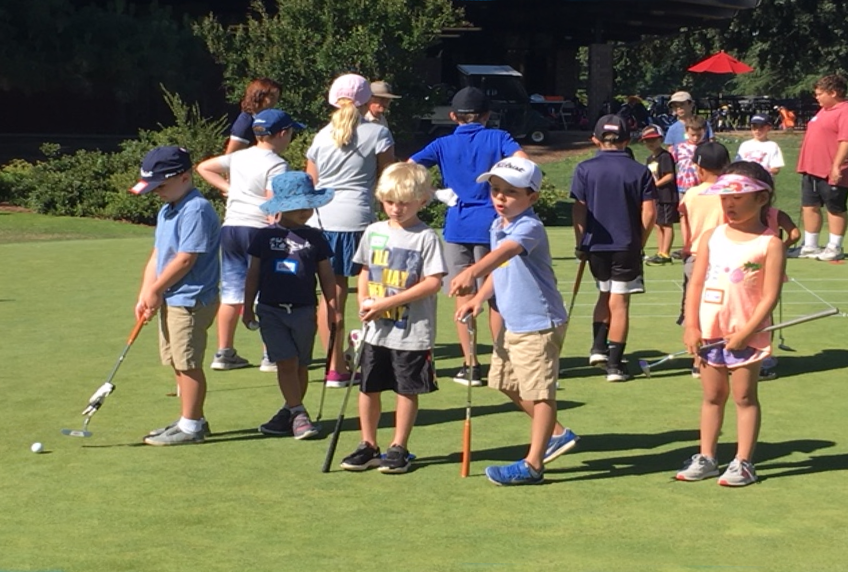 children learning golf